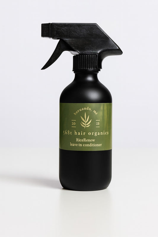 5681 Hair Collection RiceRenew organic leave-in conditioner spray in a matte black bottle with a green label